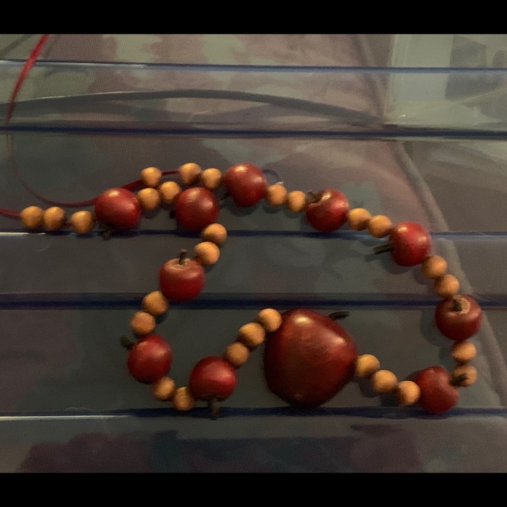 Apple necklace.